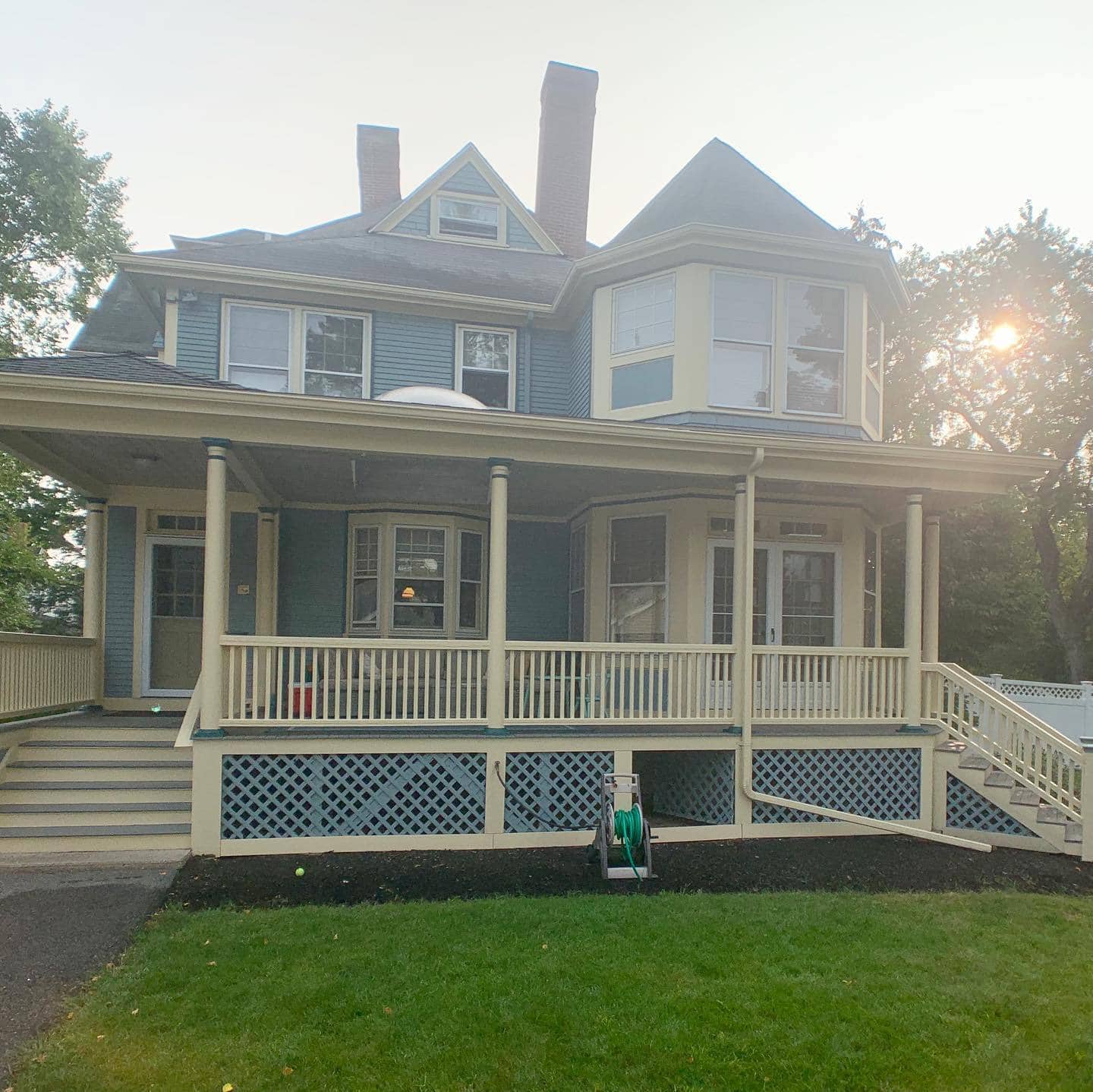 Gallagher Painting completed blue Victorian exterior